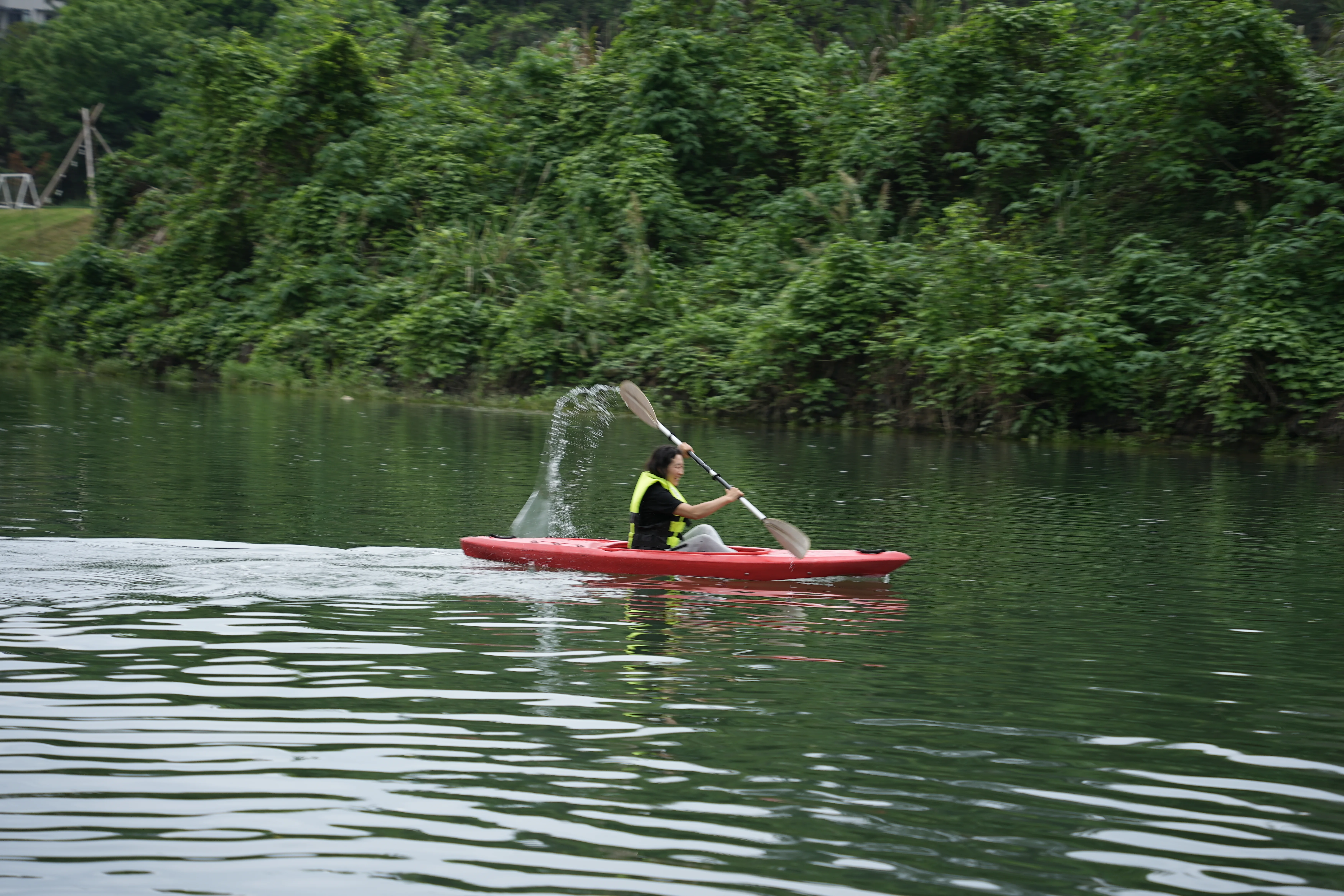 Aerial view of participants in life jackets on the Yulong River through the Yangshuo karst landscape